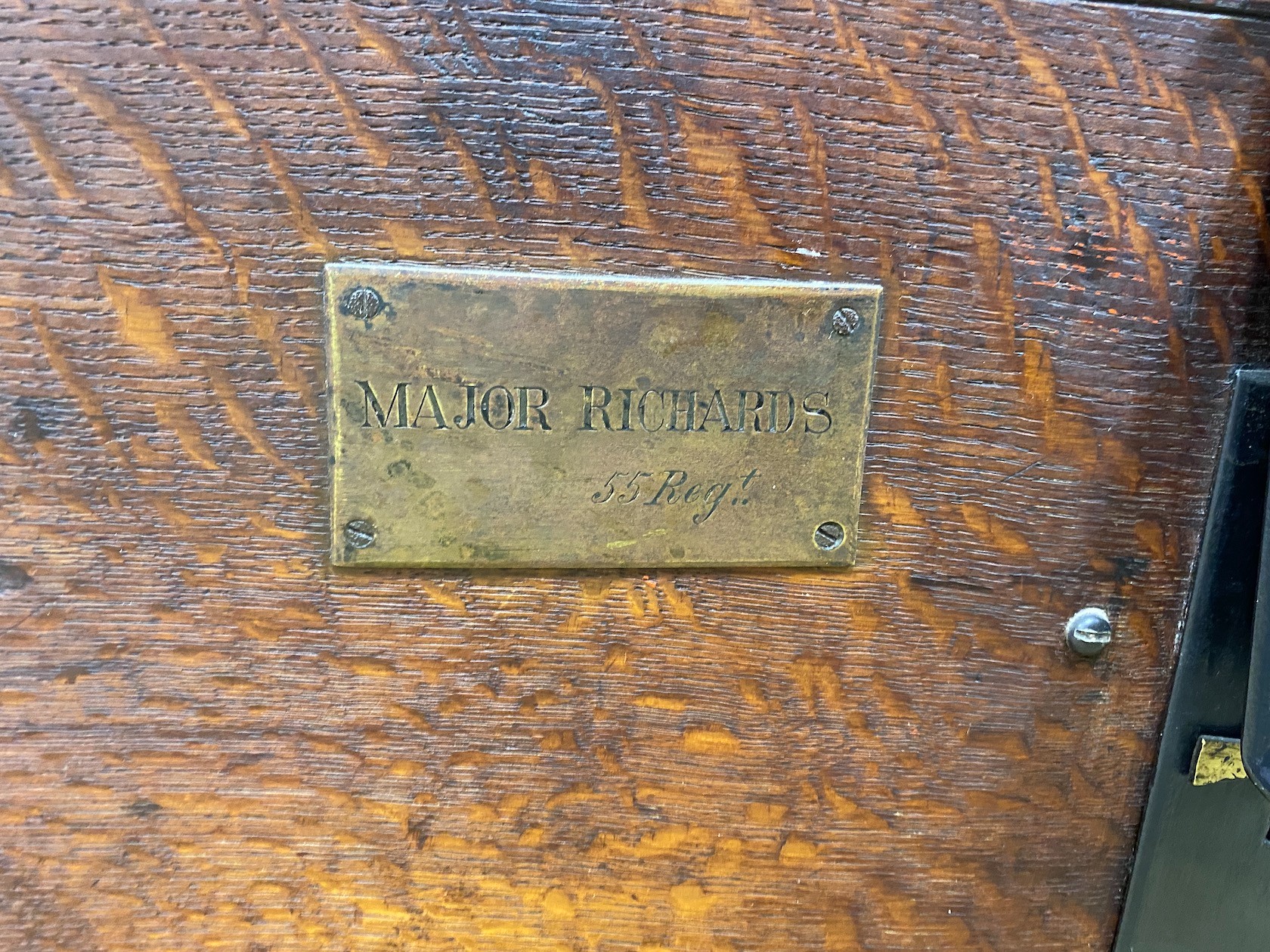 A Victorian iron bound oak silver chest, bears engraved brass plaque, “Major Richards 55 Regt”, width 71cm, depth 35cm, height 38cm